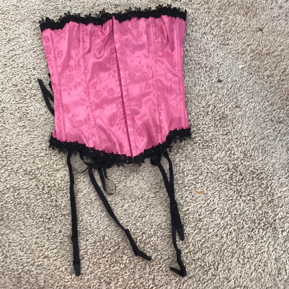 Pink and black laced corset